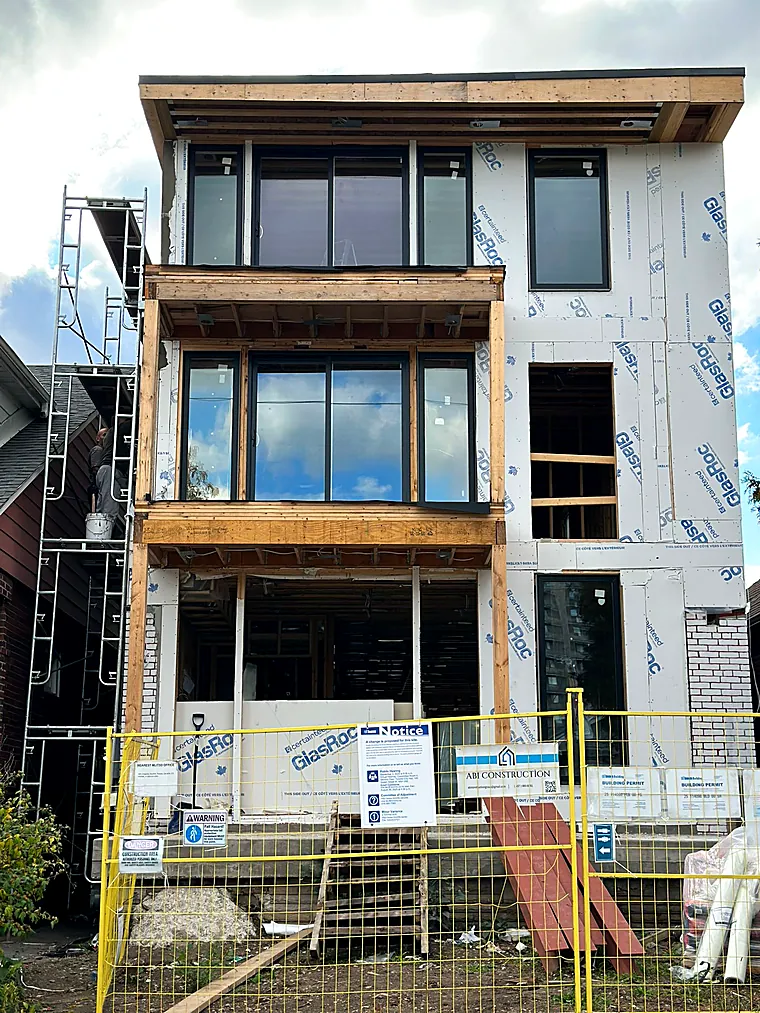 Three-storey home wrapped and scaffolded, ready for cladding